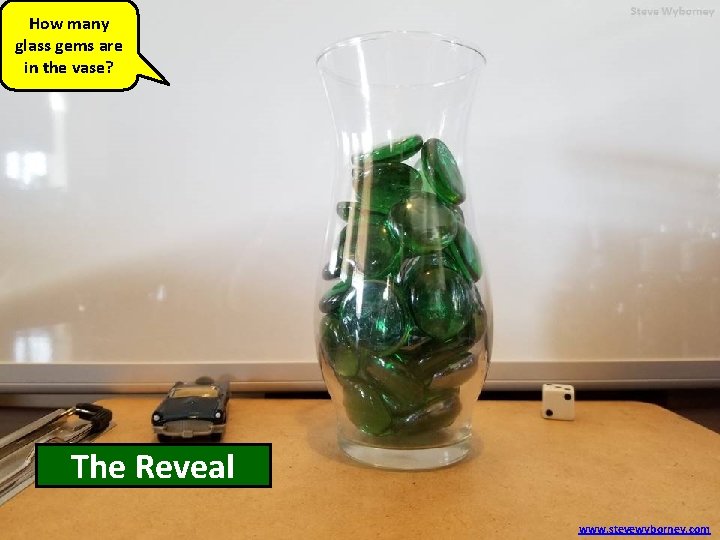 How many glass gems are in the vase? 47 The glass Reveal gems www.