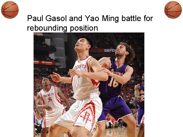 Paul Gasol and Yao Ming battle for rebounding position 