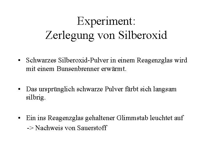 Experiment: Zerlegung von Silberoxid • Schwarzes Silberoxid-Pulver in einem Reagenzglas wird mit einem Bunsenbrenner