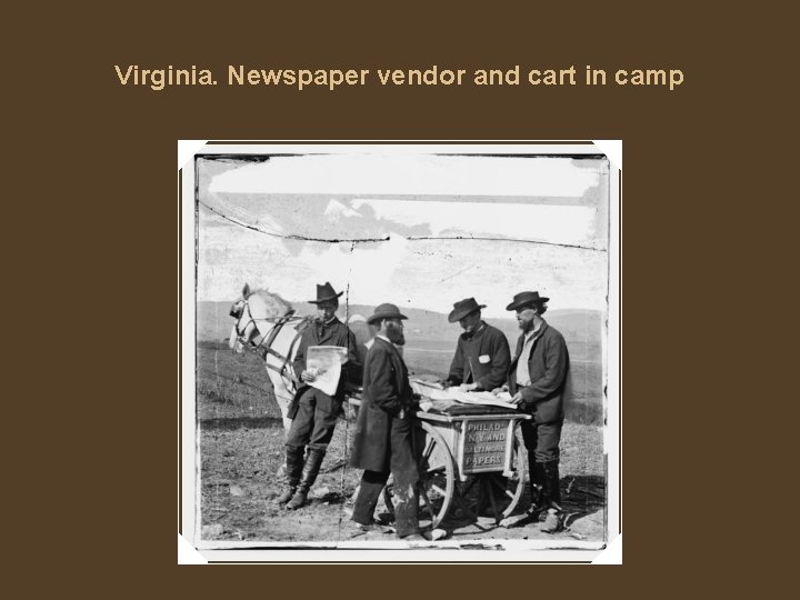 Virginia. Newspaper vendor and cart in camp 