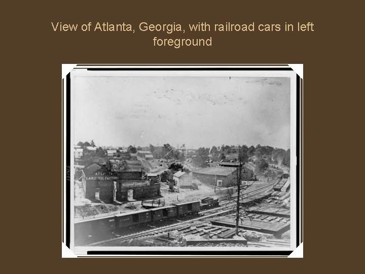 View of Atlanta, Georgia, with railroad cars in left foreground 