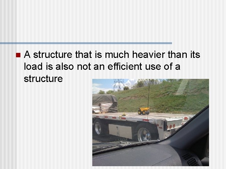 n A structure that is much heavier than its load is also not an n A structure that is much heavier than its load is also not an