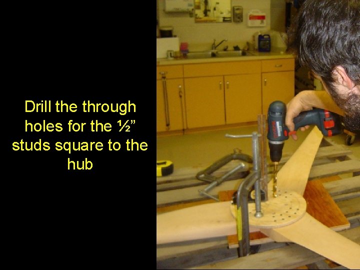 Drill the through holes for the ½” studs square to the hub 