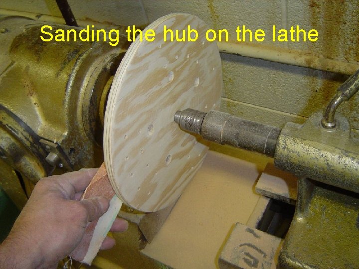 Sanding the hub on the lathe 