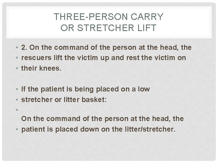 THREE-PERSON CARRY OR STRETCHER LIFT • 2. On the command of the person at