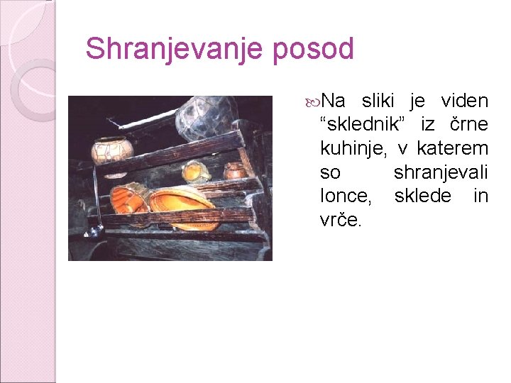 Shranjevanje posod Na sliki je viden “sklednik” iz črne kuhinje, v katerem so shranjevali