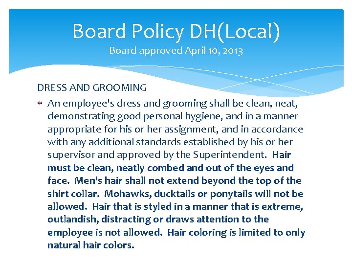 Board Policy DH(Local) Board approved April 10, 2013 DRESS AND GROOMING An employee's dress