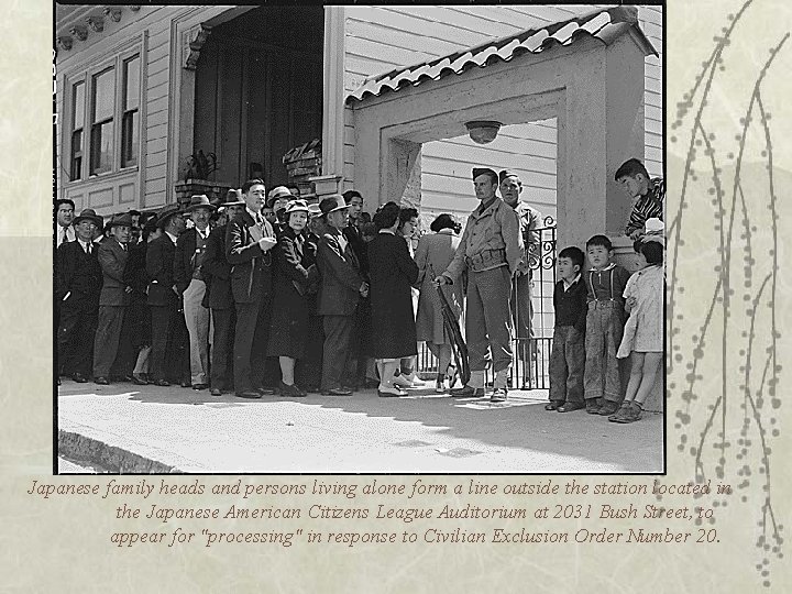 Japanese family heads and persons living alone form a line outside the station located