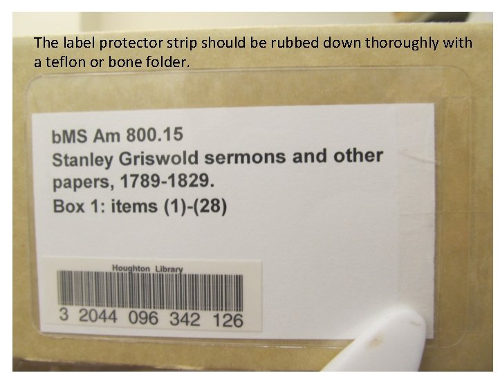 The label protector strip should be rubbed down thoroughly with a teflon or bone