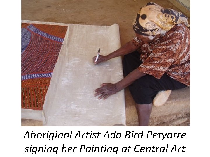 Aboriginal Artist Ada Bird Petyarre signing her Painting at Central Art 