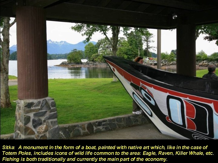 Sitka: A monument in the form of a boat, painted with native art which,