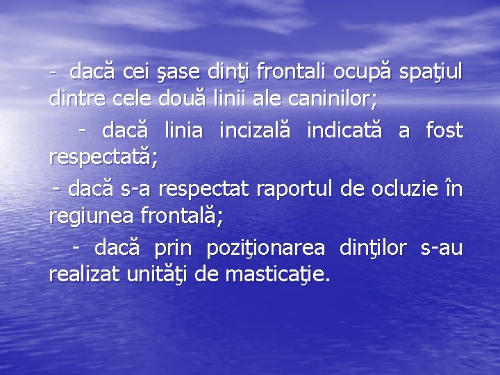  - dacă cei şase dinţi frontali ocupă spaţiul dintre cele două linii ale