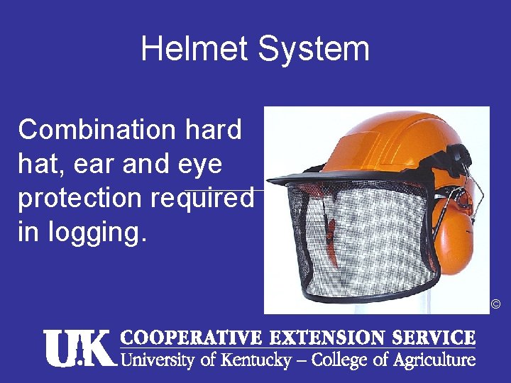 Helmet System Combination hard hat, ear and eye protection required in logging. © 