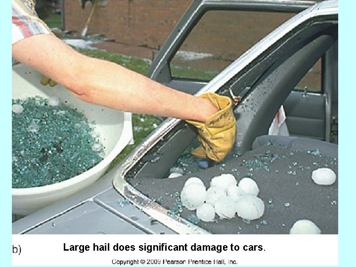 Large hail does significant damage to cars. 