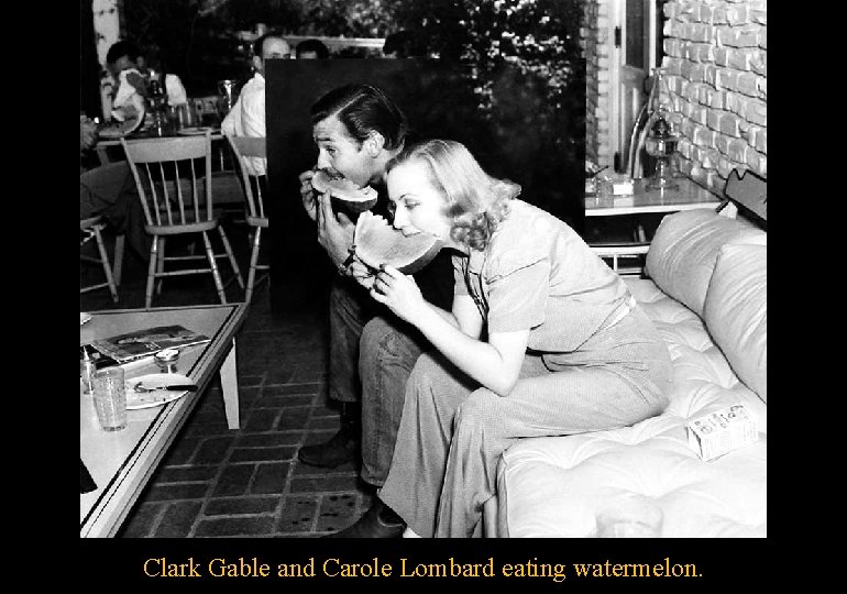 Clark Gable and Carole Lombard eating watermelon. 