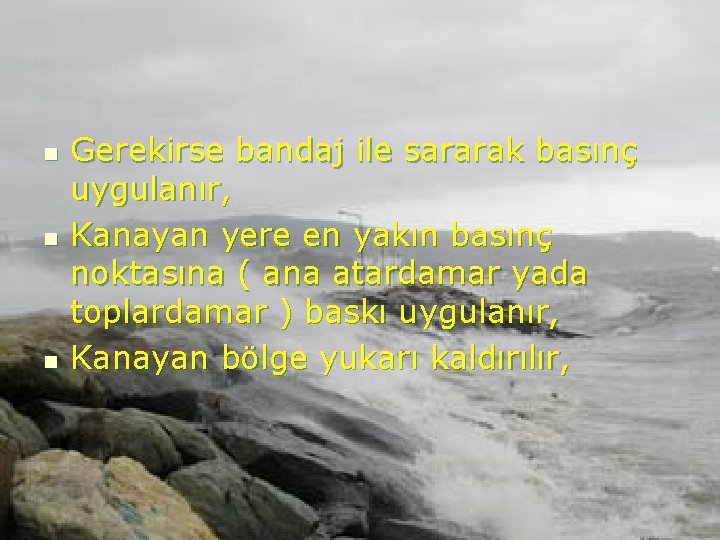 n n n Gerekirse bandaj ile sararak basınç uygulanır, Kanayan yere en yakın basınç