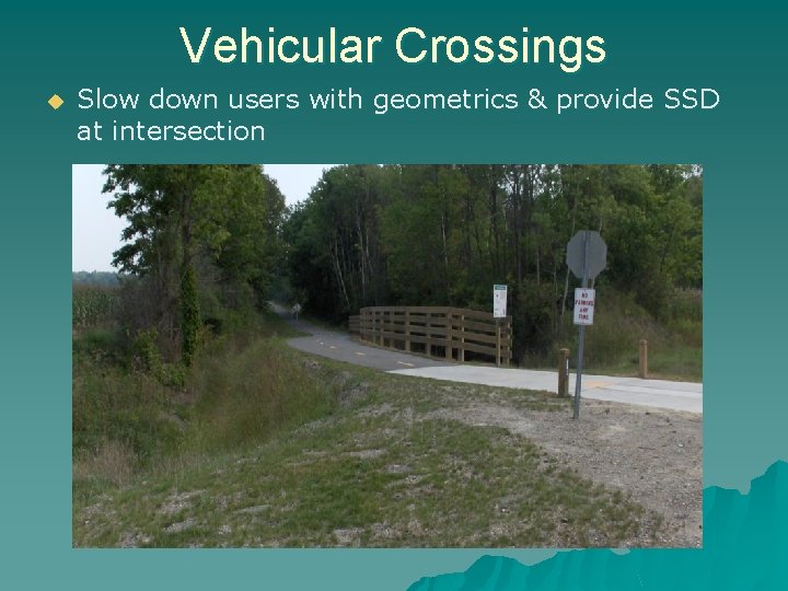 Vehicular Crossings u Slow down users with geometrics & provide SSD at intersection 