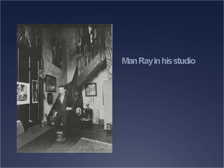 Man Ray in his studio 
