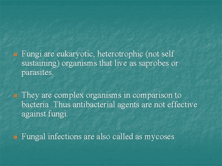 n Fungi are eukaryotic, heterotrophic (not self sustaining) organisms that live as saprobes or