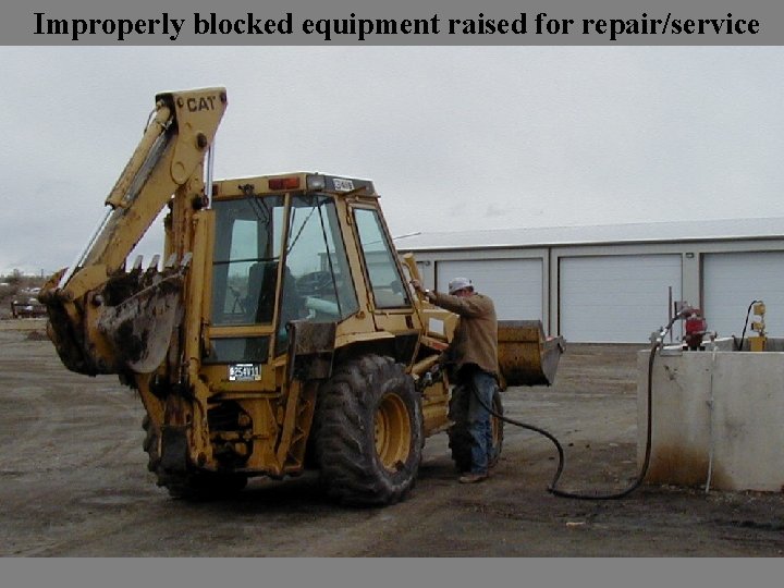 Improperly blocked equipment raised for repair/service 