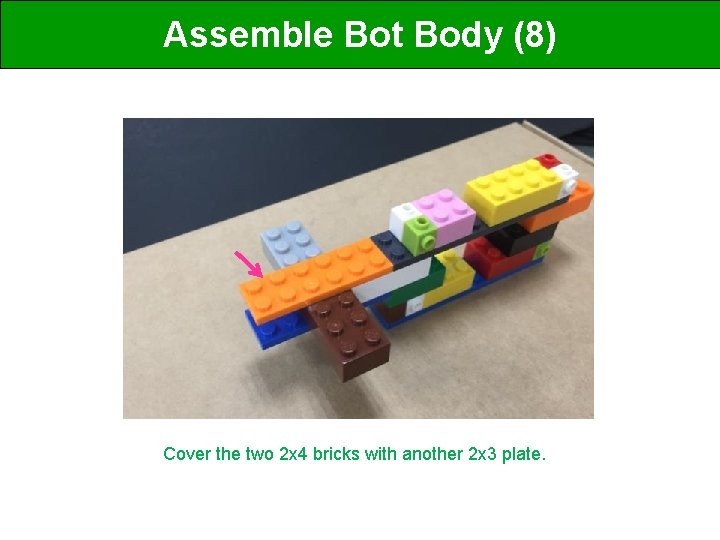 Assemble Bot Body (8) Cover the two 2 x 4 bricks with another 2