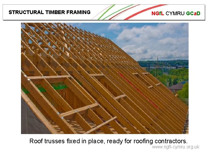 STRUCTURAL TIMBER FRAMING NGf. L CYMRU GCa. D Roof trusses fixed in place, ready