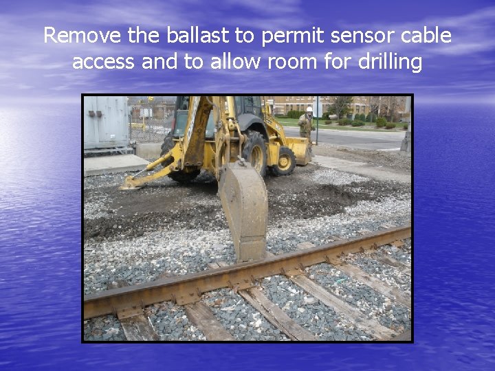 Remove the ballast to permit sensor cable access and to allow room for drilling