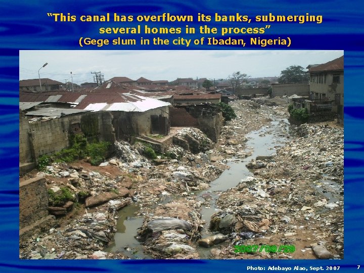“This canal has overflown its banks, submerging several homes in the process” (Gege slum