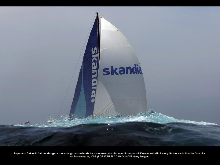 Supermaxi "Skandia" all but disappears in a trough as she heads for open water