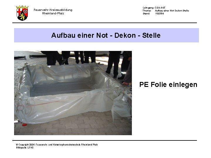 Feuerwehr-Kreisausbildung Rheinland-Pfalz Lehrgang: CSA-AGT Thema: Aufbau einer Not-Dekon-Stelle Stand: 10/2004 Aufbau einer Not -