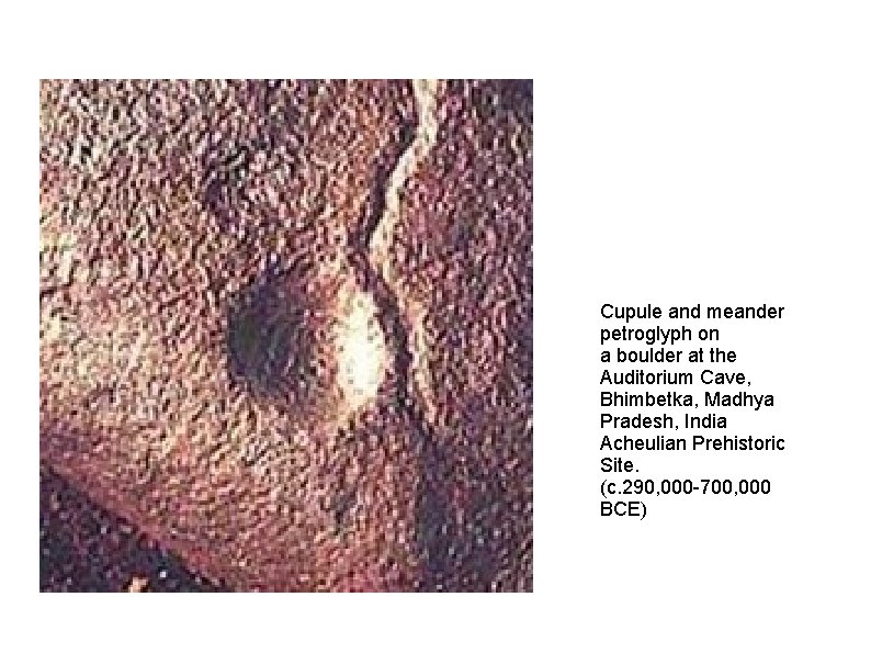 Cupule and meander petroglyph on a boulder at the Auditorium Cave, Bhimbetka, Madhya Pradesh,