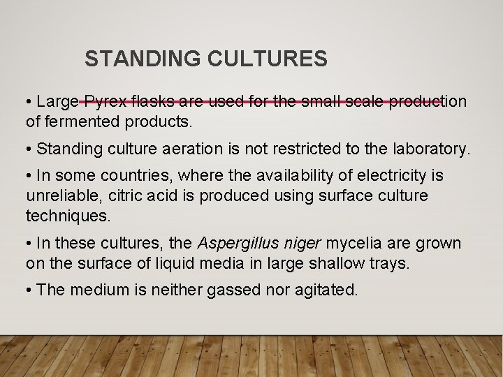 STANDING CULTURES • Large Pyrex flasks are used for the small scale production of