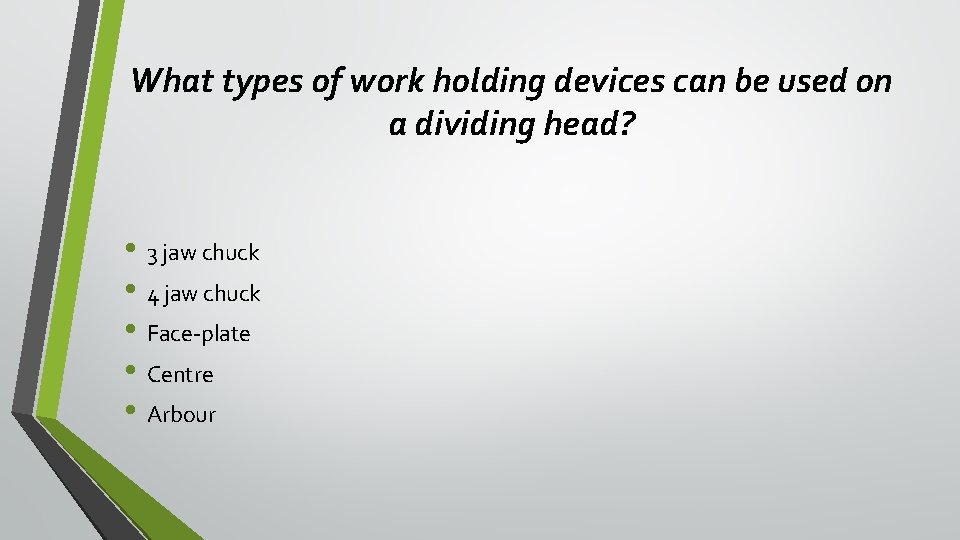 What types of work holding devices can be used on a dividing head? •