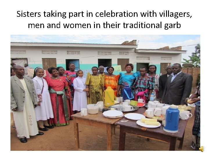 Sisters taking part in celebration with villagers, men and women in their traditional garb