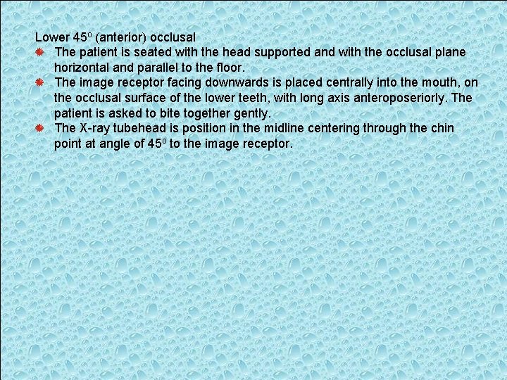 Lower 45 o (anterior) occlusal The patient is seated with the head supported and