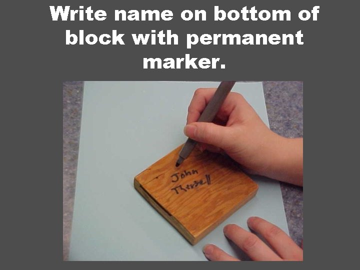 Write name on bottom of block with permanent marker. 