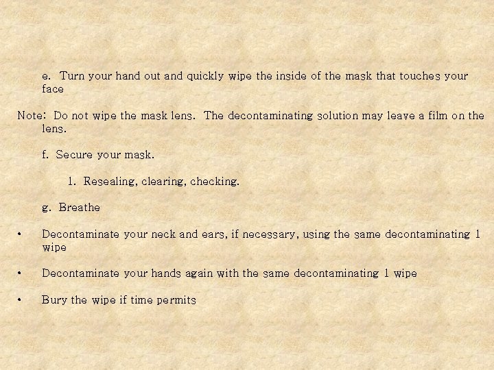 e. Turn your hand out and quickly wipe the inside of the mask that