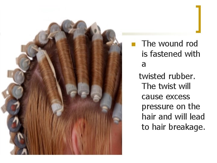 n The wound rod is fastened with a twisted rubber. The twist will cause