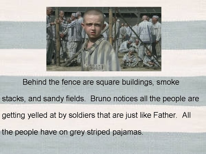 Behind the fence are square buildings, smoke stacks, and sandy fields. Bruno notices all