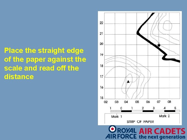 Place the straight edge of the paper against the scale and read off the