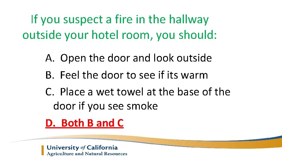 If you suspect a fire in the hallway outside your hotel room, you should: