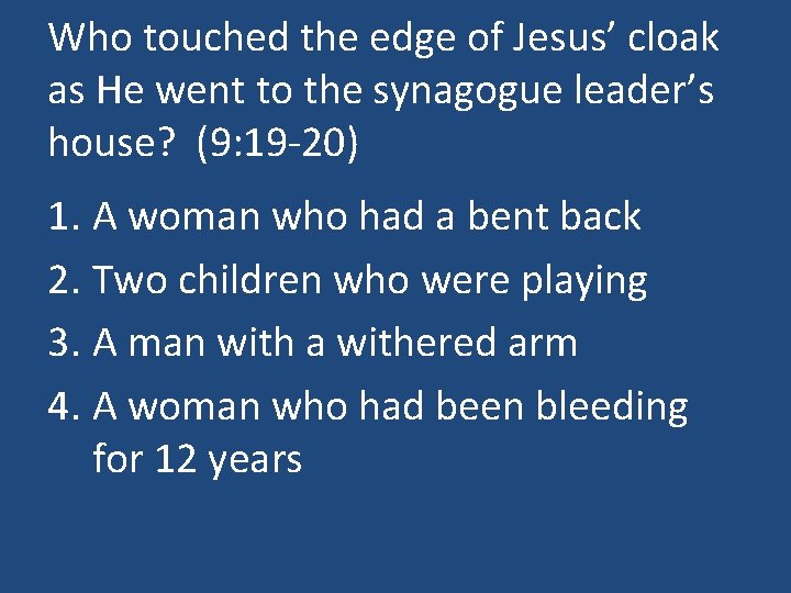 Who touched the edge of Jesus’ cloak as He went to the synagogue leader’s