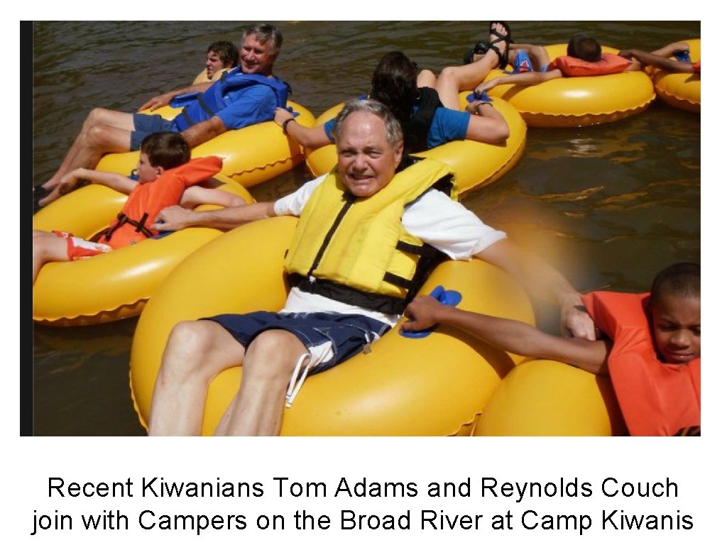 Recent Kiwanians Tom Adams and Reynolds Couch join with Campers on the Broad River