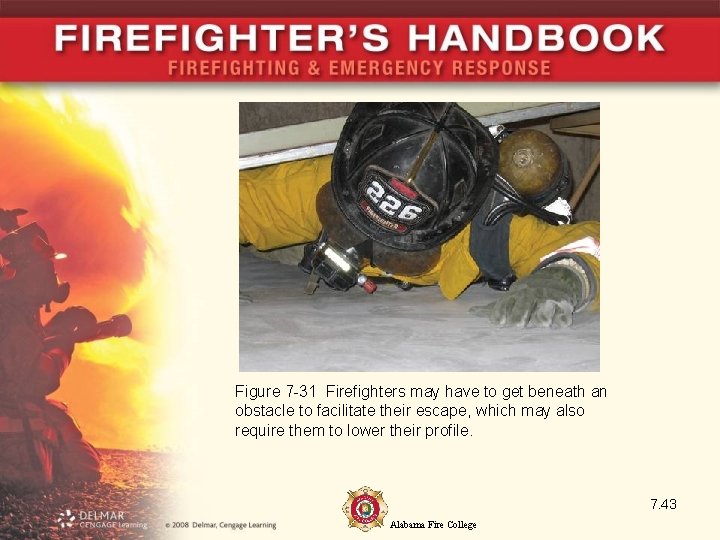 Figure 7 -31 Firefighters may have to get beneath an obstacle to facilitate their