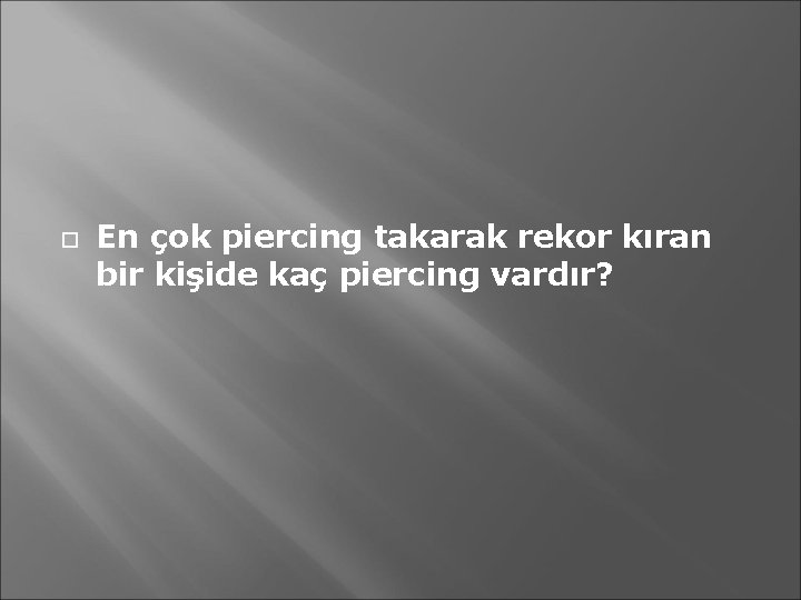  En çok piercing takarak rekor kıran bir kişide kaç piercing vardır? 