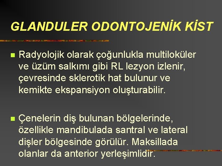 GLANDULER ODONTOJENİK KİST n Radyolojik olarak çoğunlukla multiloküler ve üzüm salkımı gibi RL lezyon