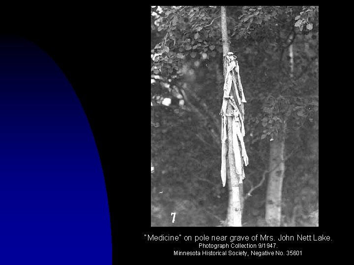 “Medicine” on pole near grave of Mrs. John Nett Lake. Photograph Collection 9/1947. Minnesota