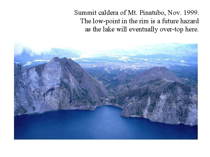 Summit caldera of Mt. Pinatubo, Nov. 1999. The low-point in the rim is a