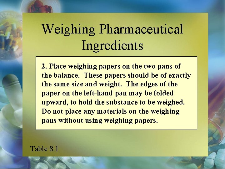 Weighing Pharmaceutical Ingredients 2. Place weighing papers on the two pans of the balance.