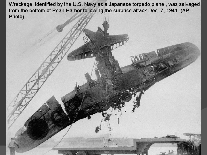 Wreckage, identified by the U. S. Navy as a Japanese torpedo plane , was